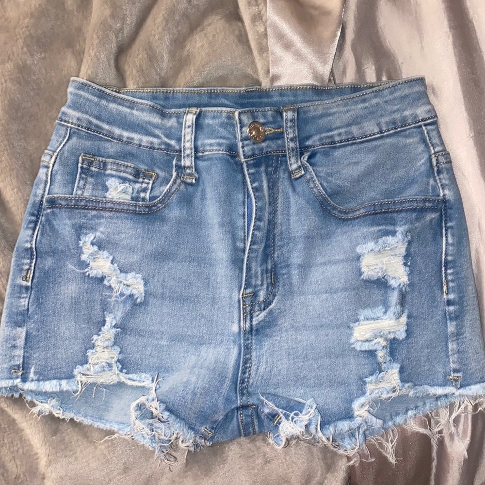 light wash ripped jean shorts
